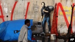 از بنکسی کارهای زیادی مشهور هستند. از جمله این نقاشی که استیو جابز را کشیده و یادآور شده او نیز مهاجرزاده بود. 