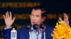FILE - Cambodia's Prime Minister Hun Sen delivers a speech during a groundbreaking ceremony to build the country's first expressway, in Kampong Speu province, south of Phnom Penh, Cambodia, Friday, March 22, 2019.