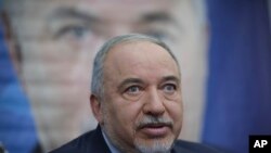 FILE - Former Israeli Defense Minister and Yisrael Beiteinu party leader Avigdor Lieberman speaks to journalists during a press conference in Tel Aviv, Israel, May 30, 2019.