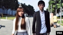 香港本土派青年新政梁督恒及游蕙祯。（美国之音汤惠芸拍摄）