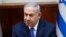 FILE - Israeli Prime Minister Benjamin Netanyahu chairs the weekly cabinet meeting in Jerusalem, March 3, 2019.