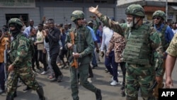 Corneille Nangaa (à dr.), le coordinateur de l'Alliance fleuve Congo (AFC), dont fait partie le M23.