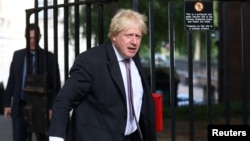 Boris Johnson arrives at 10 Downing Street in London, July 3, 2018. 