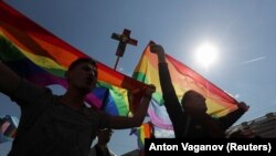 RUSSIA -- Activists of a local LGBT community attend a May Day rally in St. Petersburg, May 1, 2019