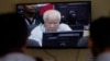 Khieu Samphan, former Khmer Rouge head of state, is seen on screen at the court's press center at the U.N.-backed war crimes tribunal on the outskirts of Phnom Penh, Cambodia, Nov. 16, 2018.