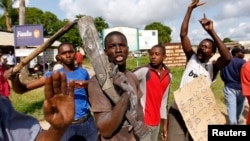File photo shows residents chanting slogans as they protest in Kenya. Youth ministers recently met to discuss challenges: massive unemployment and the failure to involve young people in decision-making processes.