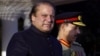 Newly elected Prime Minister of Pakistan Nawaz Sharif (L) arrives at the Prime Minister''s house to review guards of honor in Islamabad, June 5, 2013. 