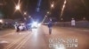 In this Oct. 20, 2014 frame from dash-cam video provided by the Chicago Police Department, Laquan McDonald walks down the street moments before being shot by police officer Jason Van Dyke. 