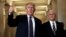 U.S. President Donald Trump gives a thumbs-up as he and Vice President Mike Pence depart the U.S. Capitol after a meeting to discuss tax legislation with House Republicans, Nov. 16, 2017. 