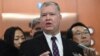 U.S. special representative on North Korea Stephen Biegun, center, speaks to reporters as his South Korean counterpart Lee Do-hoon, right, looks on after their "working group" meeting handling North Korean issues at the Foreign Ministry in Seoul on Dec.