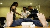 'Wonder' students Bongiwe Tyhala (left), Pumza Ghu (middle) and Gerald Maarman, practice medical procedures on a dummy at Stellenbosch University's Tygerberg faculty of medicine
