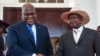 President of Democratic Republic of Congo (DRC) Felix Tshisekedi (L) shakes hands with Uganda's President Yoweri Museveni upon his arrival to discuss business between the two countries at the state house in Entebbe, Uganda, Nov. 9, 2019. 