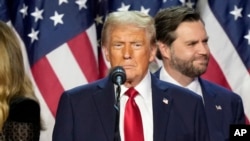 前美国总统特朗普在总统大选获胜后的集会上.