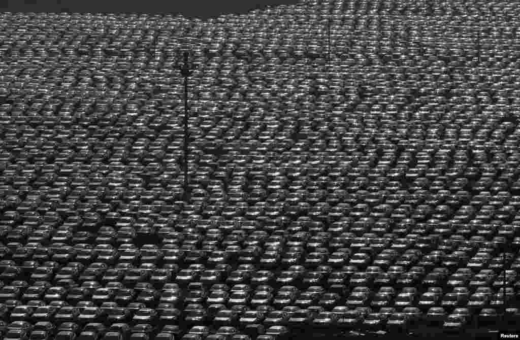 New vehicles park at a Chinese automobile factory in Shenyang, Liaoning province. 