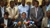 Kalonzo Musyoka, center, Kenya's current Vice President and running mate of presidential candidate Raila Odinga, speaks at a press conference in Nairobi, Kenya, Mar. 7, 2013.