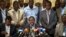 Kalonzo Musyoka, center, Kenya's current Vice President and running mate of presidential candidate Raila Odinga, speaks at a press conference in Nairobi, Kenya, Mar. 7, 2013.