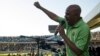The Association of Mineworkers and Construction Union (AMCU) President Joseph Mathunjwa speaks to striking mine workers at the Royal Bafokeng Stadium in Rustenburg, June 23, 2014.