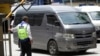 FILE - An unidentified van believed to be carrying the body of Kim Jong Nam comes out from the forensic department at Kuala Lumpur Hospital in Kuala Lumpur, Malaysia, March 30, 2017.