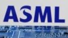 ILUSTRASI - Logo ASML di dekat motherboard komputer, 8 Januari 2024. (Dado Ruvic/REUTERS)