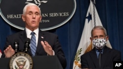 美国副总统彭斯在有关新冠疫情的记者会上。