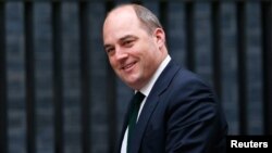FILE - Ben Wallace, who then was parliamentary undersecretary of state for the Northern Ireland Office, is pictured as he arrives for a cabinet meeting at 10 Downing Street in London, May 12, 2015.