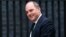 FILE - Ben Wallace, who then was parliamentary undersecretary of state for the Northern Ireland Office, is pictured as he arrives for a cabinet meeting at 10 Downing Street in London, May 12, 2015.