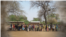 FILE - A long line at a food-distribution site in Malawi. (Credit: WFP)
