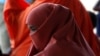 A Somali refugee waits to board a U.N. plane bound for Somalia, part of the UN's Voluntary Repatriation program, in the Dadaab refugee camp, Kenya, Dec. 19, 2017.