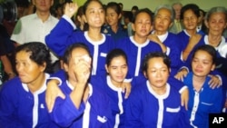 Thirteen women hastily convicted in May after their arrest in a land demonstration were released from jail on Wednesday, June 27, 2012. 