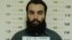 FILE - Anas Haqqani, a senior leader of the Haqqani network, arrested by the Afghan Intelligence Service (NDS) in Khost province is seen in this handout picture released October 16, 2014. 