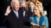 Joe Biden is sworn in as the 46th president of the United States by Chief Justice John Roberts as Jill Biden holds the Bible during the 59th Presidential Inauguration at the U.S. Capitol in Washington, U.S., January 20, 2021. Andrew Harnik/Pool via…