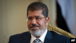 Presiden Mohamed Morsi dilaporkan akan melakukan kompromi dengan Majelis Kehakiman Mesir untuk menghindari krisis politik yang lebih gawat (foto: dok).