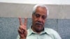 Hashem Khastar, an Iranian teachers union leader based in Mashhad, makes a victory gesture in this undated photo. His wife told VOA that security personnel detained him near Mashhad on Oct. 23, 2018, and sent him to a hospital for a purported mental illness.