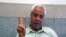 Hashem Khastar, an Iranian teachers union leader based in Mashhad, makes a victory gesture in this undated photo. His wife told VOA that security personnel detained him near Mashhad on Oct. 23, 2018, and sent him to a hospital for a purported mental illness.