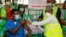 FILE - Dr. Ngong Cyprian gets a dose of COVID-19 vaccine at the National hospital in Abuja, Nigeria, March 5, 2021.