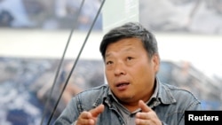 知名中国籍摄影师卢广