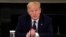 U.S. President Donald Trump talks about taking hydroxychloroquine at coronavirus response event with restaurant executives at White House in Washington, May 18, 2020.
