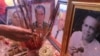FILE - Photos of analyst Kem Ley are placed at his funeral ceremony at a Buddhist pagoda Wat Kdei Chas, in the outskirts of Phnom Penh, on Monday, July 11, 2016. (Hean Socheata/VOA Khmer)