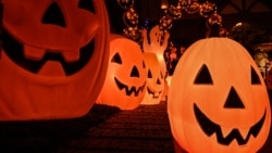 A home is decorated with pumpkins and ghosts for Halloween, in Burbank, California, Oct. 30, 2021.
