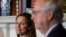 Supreme Court nominee Judge Amy Coney Barrett looks over to Senate Majority Leader Mitch McConnell of Kentucky as they meet with on Capitol Hill in Washington, Sept. 29, 2020. 