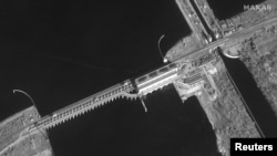 Picha ya Satellite inayoonyesha bwawa la kuzalisha umeme la Kakhovka, Nova Kakhovka. Febrauri 26, 2022