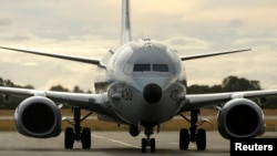 资料照：一架参加2014年失踪马航370班机搜索行动的美国海军P-8侦察机。