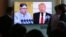 People watch a TV screen showing file footage of U.S. President Donald Trump, right, and North Korean leader Kim Jong Un during a news program at the Seoul Railway Station in Seoul, South Korea, April 21, 2018. 