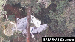 Pesawat Rimbun Air Cargo seri Twin Otter 300 PK-OTW yang hilang kontak dalam penerbangan menuju Intan Jaya, Papua, Rabu (15/9). (Foto: Courtesy/Basarnas)