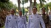 Thailand Prime Minister Prayuth Chan-ocha, second right walks to attend a cabinet meeting with aides and at the Government House of Thailand in Bangkok, Thailand, Tuesday, Aug. 27, 2019. Prayuth Chan-ocha omitted a sentence in the oath of office…