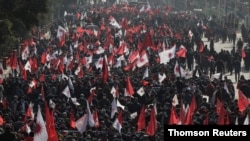 Protesters affiliated with a faction of the ruling Nepal Communist Party take part in a rally against the dissolution of parliament, in Kathmandu, Nepal Dec. 29, 2020.