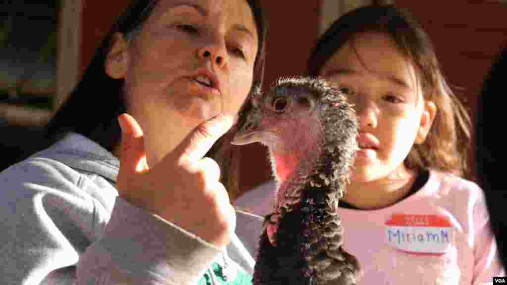 Students wearing bird costumes dance during the annual Caracol Festival in Manila, the Philippines.