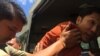 FILE - Prison authority push Ny Sokha, Adhoc's head of monitoring, into a car after the appeals court had announced its verdict on September 02, 2016. (Kann Veichika/VOA Khmer)