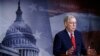 FILE - Senate Majority Leader Mitch McConnell of Ky., speaks with reporters after the Senate approved a nearly $500 billion coronavirus aid bill, April 21, 2020, on Capitol Hill in Washington.