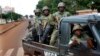 FILE - African Union MISCA troops from Cameroon patrol in Bangui, Central African Republic, May 29, 2014.